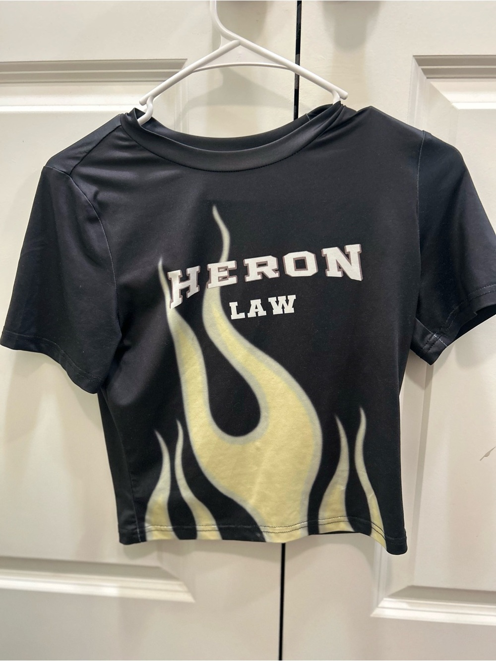 Heron Law Black Crop Tee with Yellow Flame Graphic